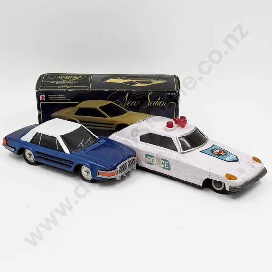 Boxed China MF309 Tinplate New Sedan and Unboxed MF051 Tinplate Police Car