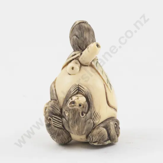 Signed Ivory Netsuke of Monkeys on an Oversized Peach