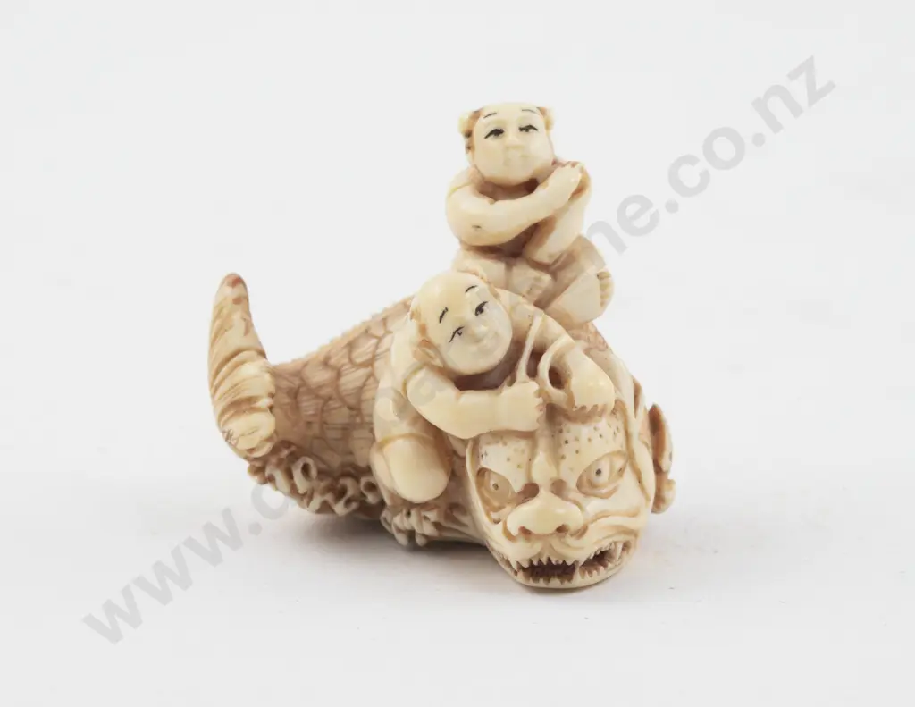 Signed Ivory Netsuke of Two Children Riding a Demon Fish Image 1++