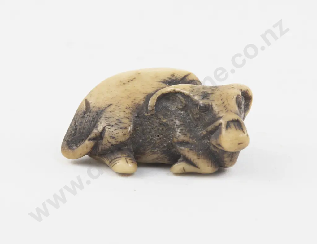Carved Deer Horn Netsuke of a Reclining Buffalo Image 1++
