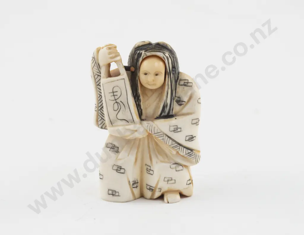 Carved Ivory Netsuke of a Noh Actor with Rolling Head Image 1++