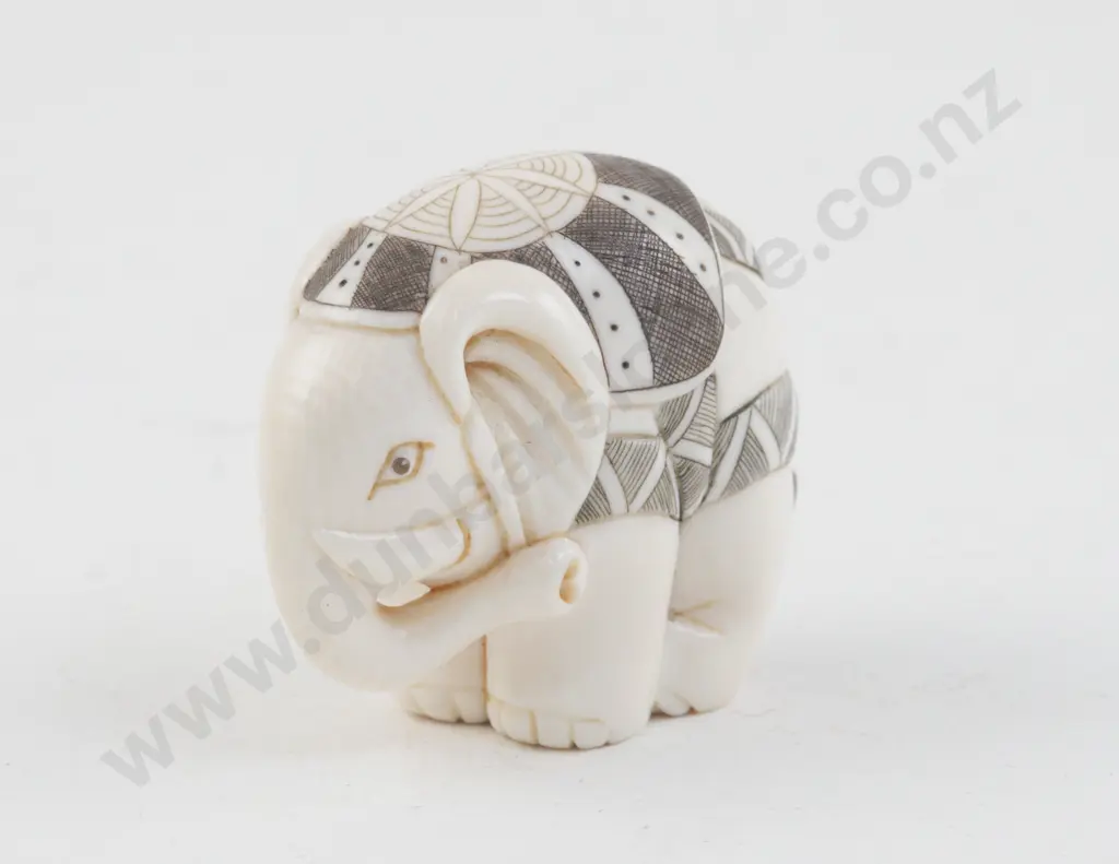 Signed and Stained Ivory Netsuke of an Elephant Image 1++