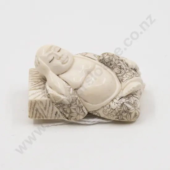 Signed Ivory Netsuke of a Reclined Sleeping Hotei