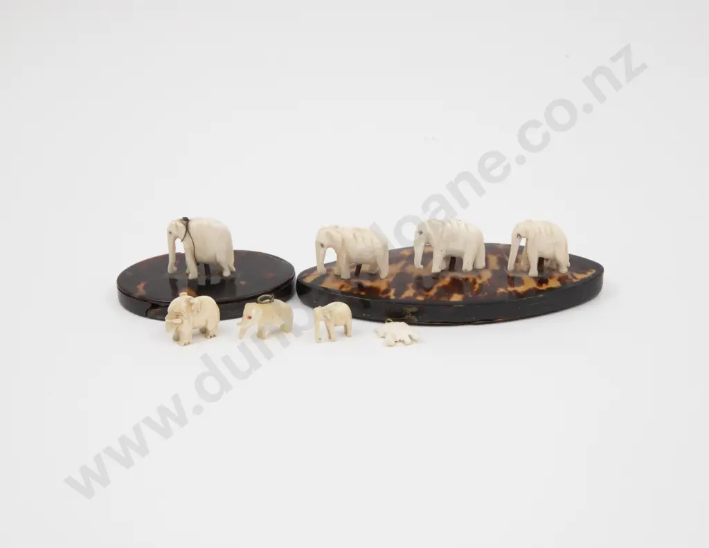 Two Vintage Tortoise Shell and Bone Carved Elephant Mounted Desk Paper Weights and Four Elephant Charms Image 1++