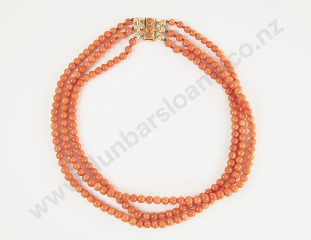Triple Strand Slightly Graduated Coral Bead Necklace Image 1++