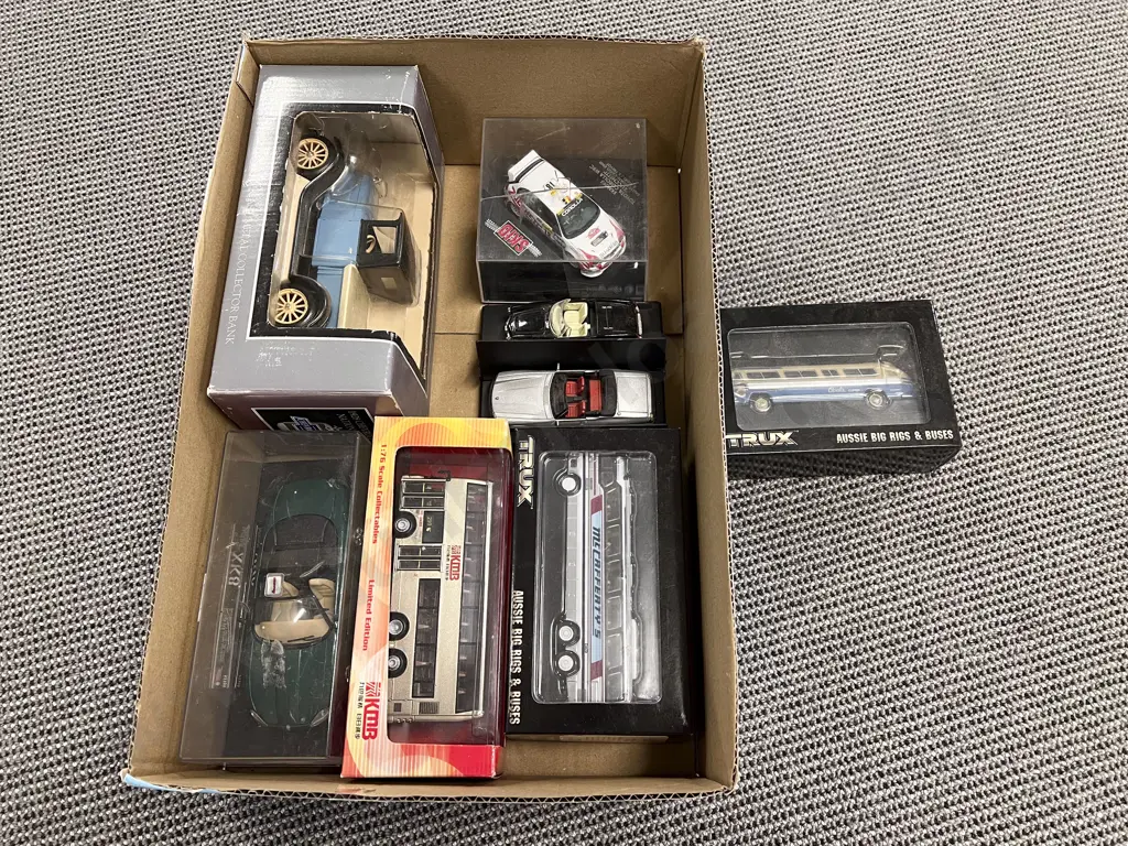Eight Boxed and Unboxed Vehicle Models Image 1++