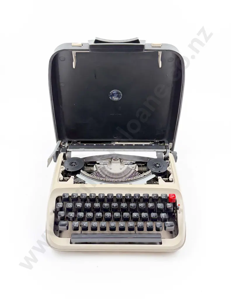 Vintage Portable Typewriter Image 1++