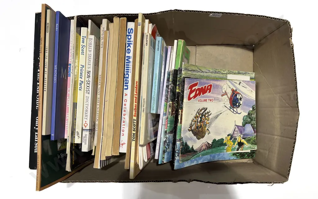 Box of Assorted Newpaper Comic Books Image 1++