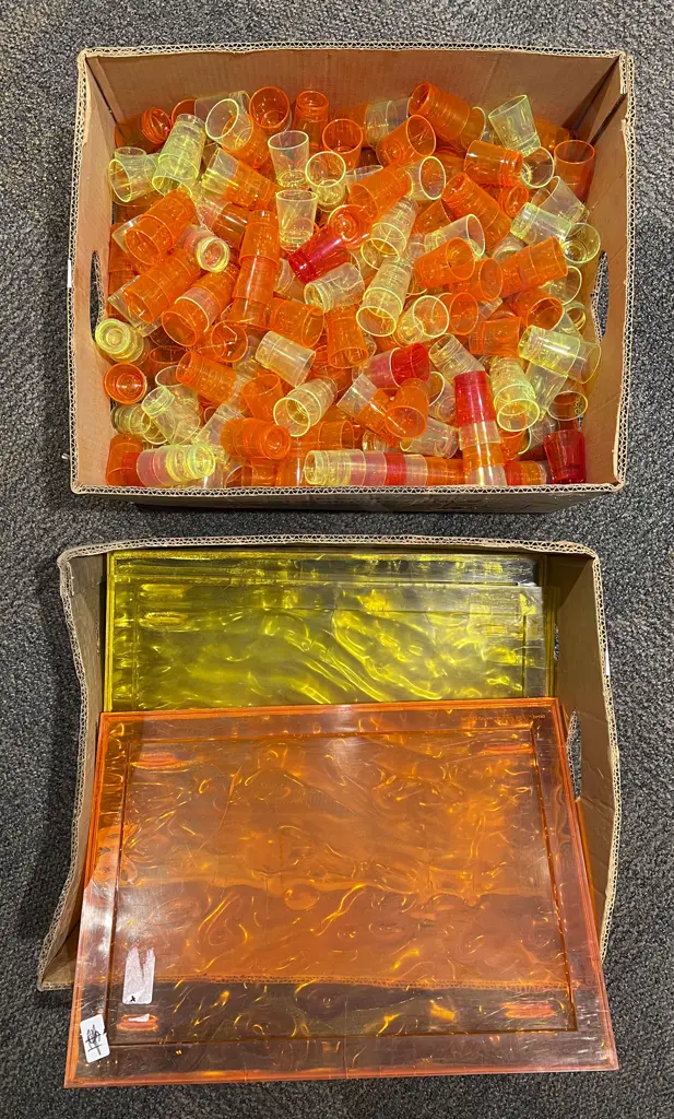 Two Boxes of Assorted Decorative Plastic Shot Glasses and Chopping Boards Image 1++