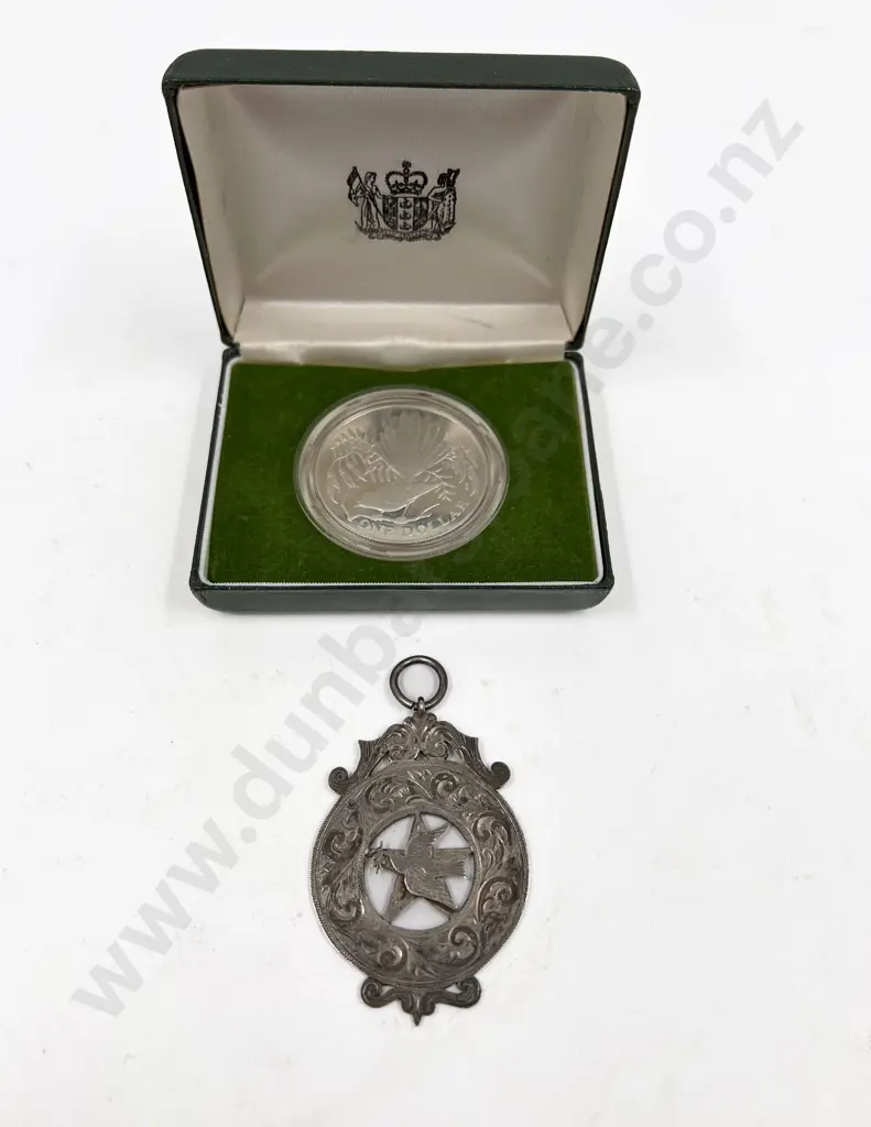 NZ 1980 One Dollar Silver Coin and NZ Medallion Presented to Sister N. Cohen 1923 Image 1++