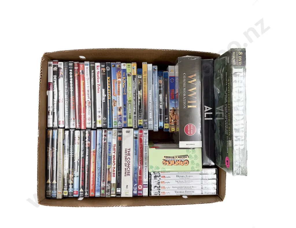 Quantity of Assorted DVDs Image 1++