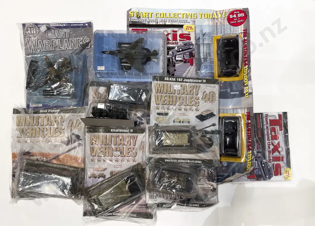 Various Magazine Model Military Craft and Two London Taxis Image 1++