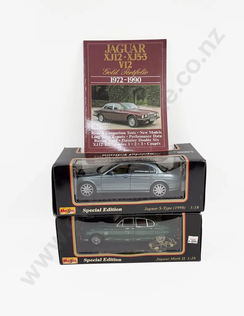 Two Maisto 1/18 Scale Jaguar Models with Booklet Image 1++