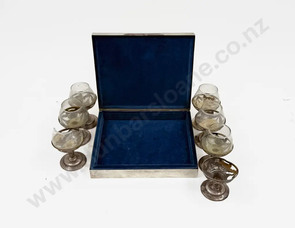 S/S Bound Cig. Box together with Seven Mexican Silver Overlay Liqueur Glasses Image 1++