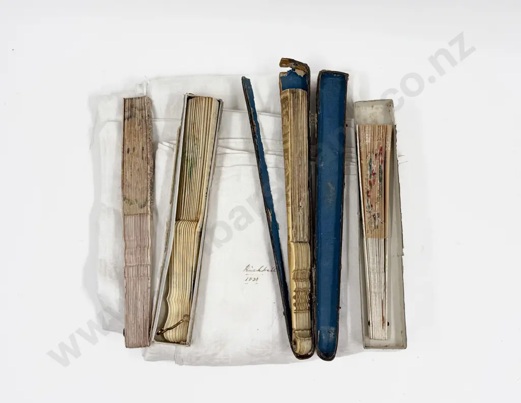 Four Decorative Fans with Vintage Linen Table Cover Image 1++