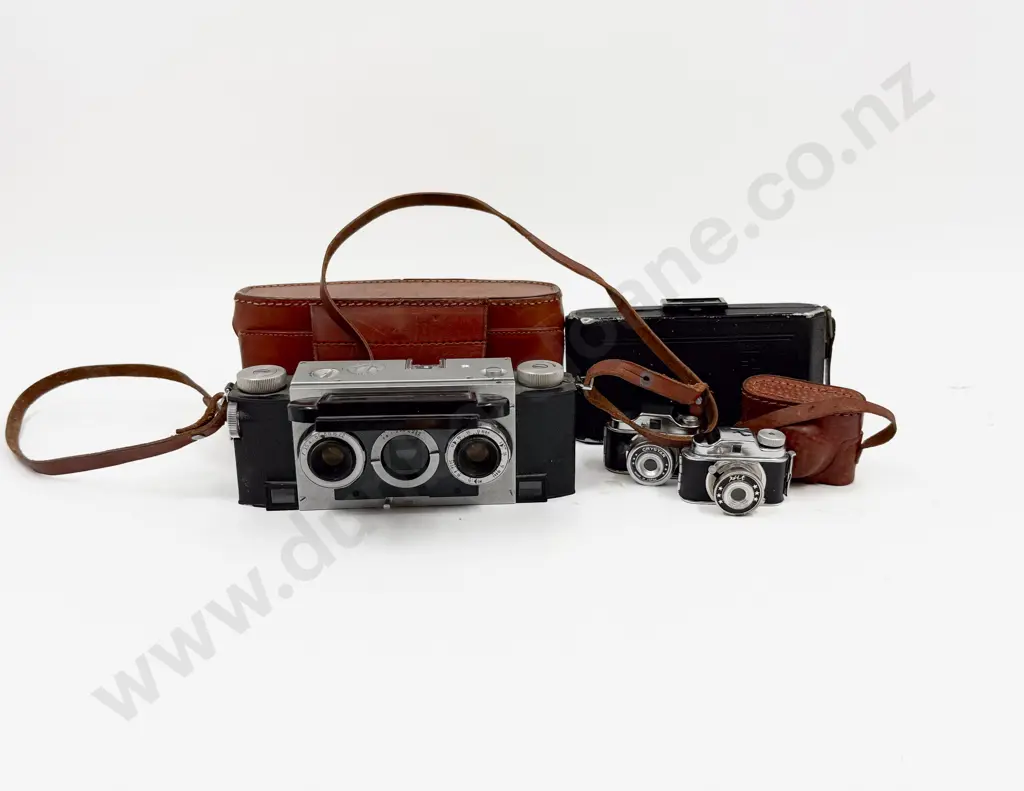 Four Assorted Vintage Cameras Image 1++