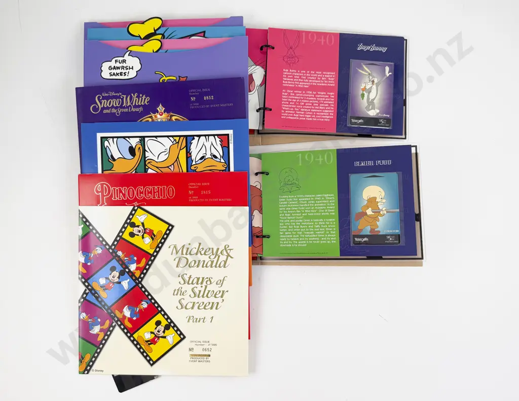 NZ Telecom Disney Limited Edition Phonecard Packs (17) and Two Warner Bros Cartoon Classics Image 1++