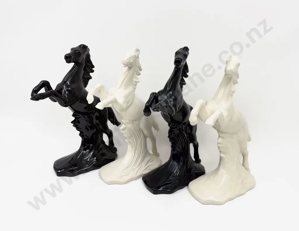 Four Horse Figurines Image 1++