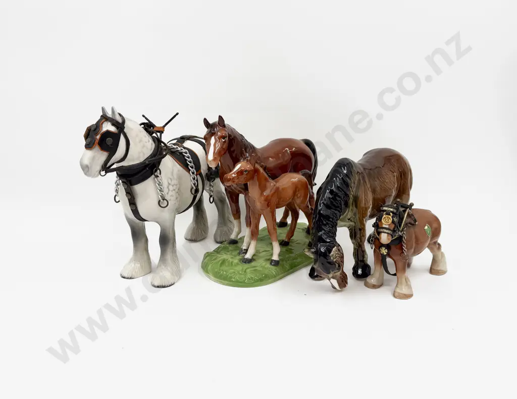 Four Horse Figurines Image 1++