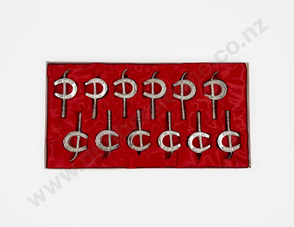 Cased Set of Twelve Horseshoe-Shaped Chopstick Rests Image 1++