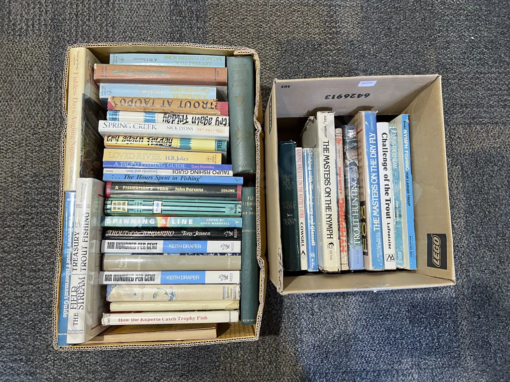 Two Boxes of Assorted Fishing Reference Volumes Image 1++