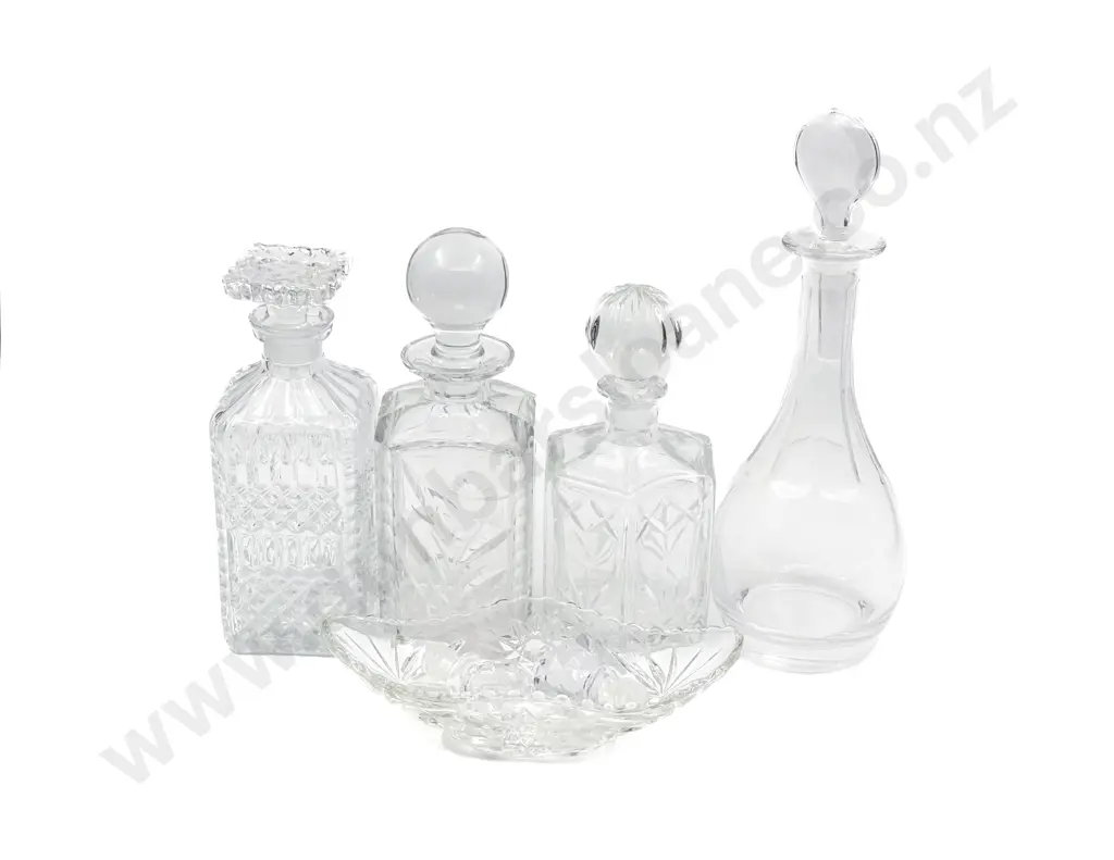 Glass Whiskey Decanter With Three Other Decanters and Assorted Stoppers Image 1++
