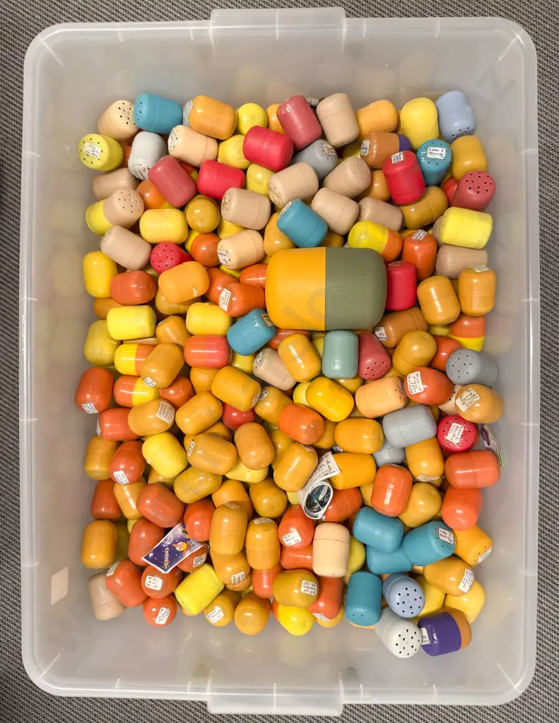 Plastic Storage Bin of Unopened Kinder Surprise Kits Image 1++