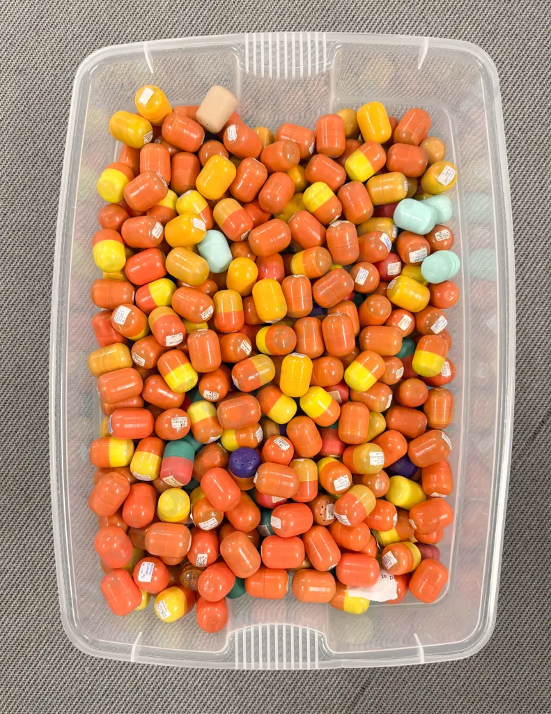 Plastic Storage Bin of Unopened Kinder Surprise Kits Image 1++