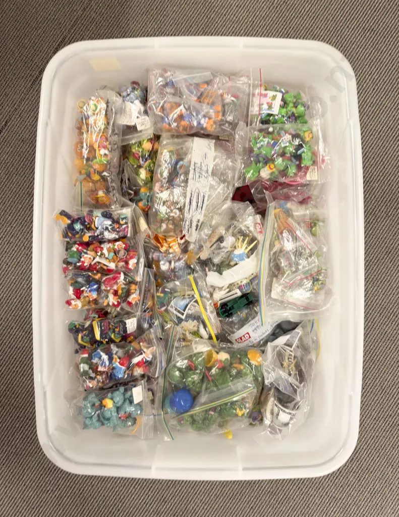 Plastic Storage Bin of Completed Kinder Surprise Toys Image 1++