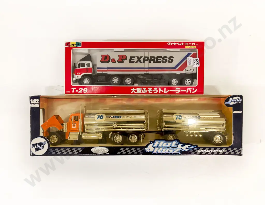 Two Boxed Large Scale Transport Trucks Image 1++