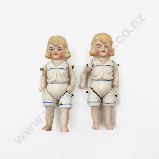 Two German All Moulded Bisque Dolls and Vintage Celluloid Costume Dolls