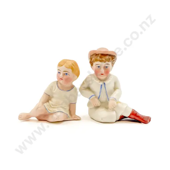 Two German Bisque Small Piano Baby Type Figures and Vintage Celluloid Costume Dolls