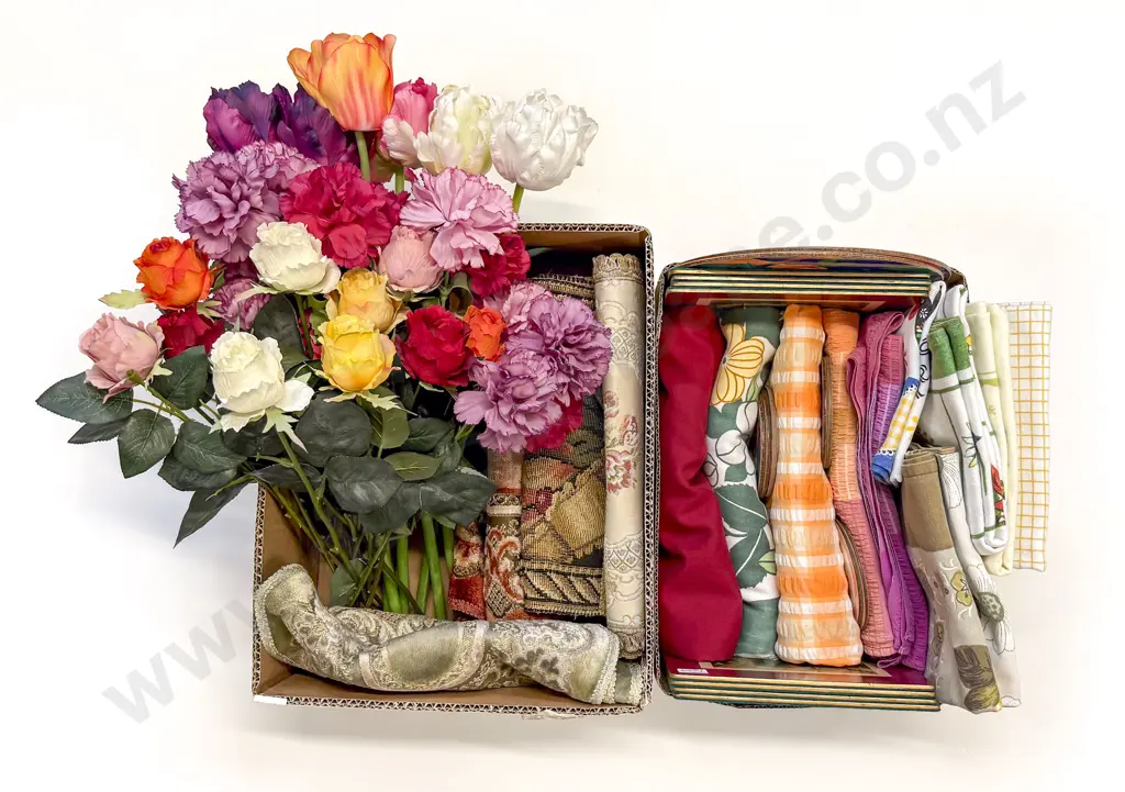 Two Boxes of Assorted Table Linen and Faux Flowers Image 1++