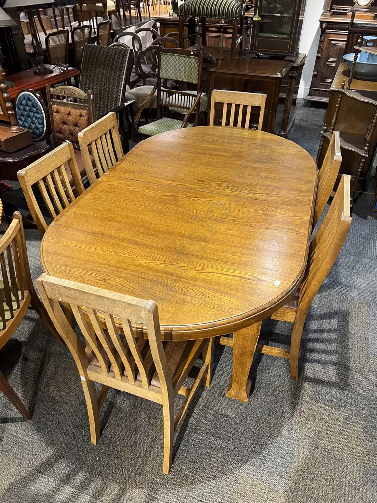 Oak  Dining Table together with Six Stick Back Dining Chairs Image 1++