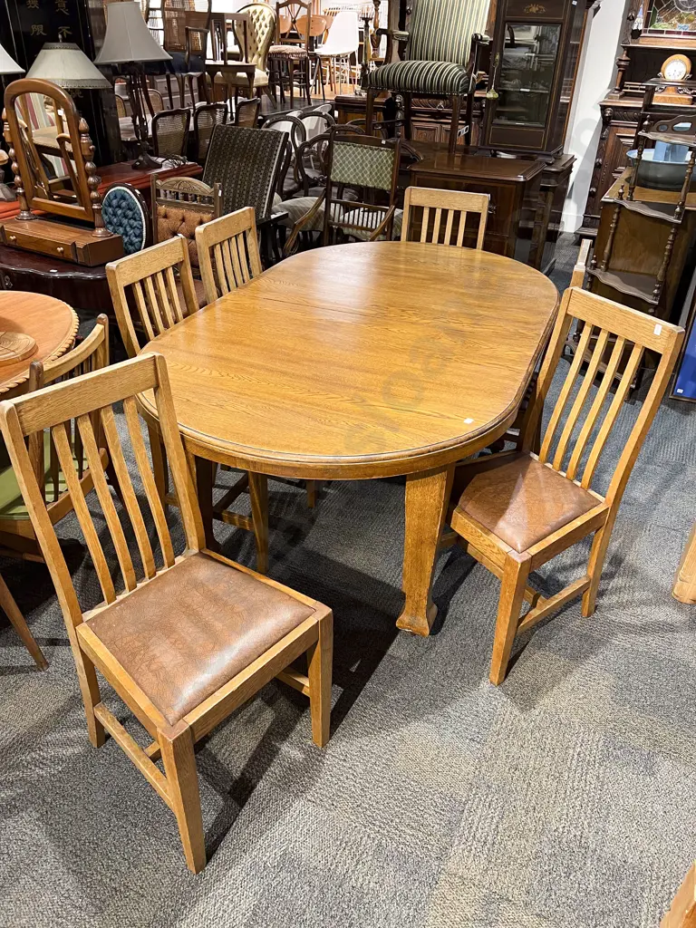 Oak  Dining Table together with Six Stick Back Dining Chairs Image 1++