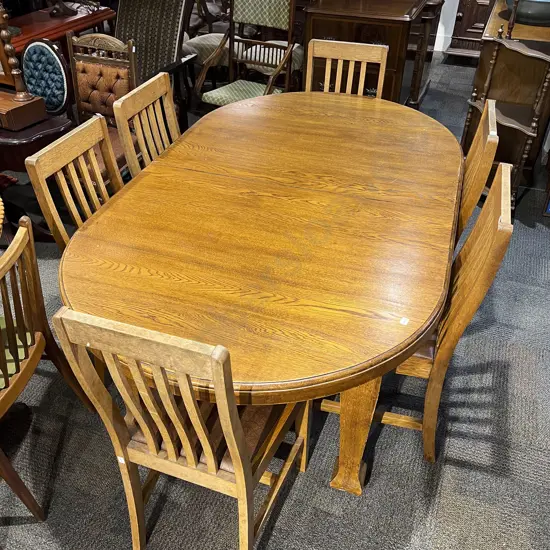 Oak  Dining Table together with Six Stick Back Dining Chairs