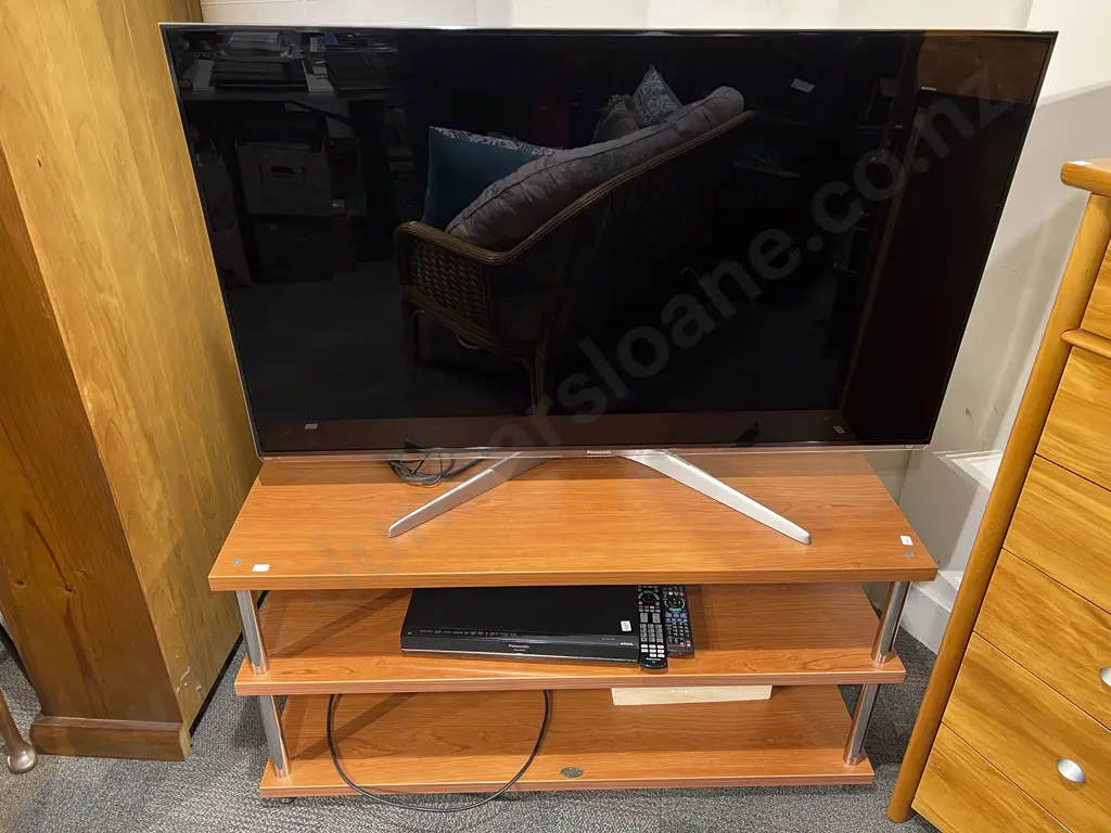 Panasonic HD TV together with Modern Entertainment Stand Image 1++