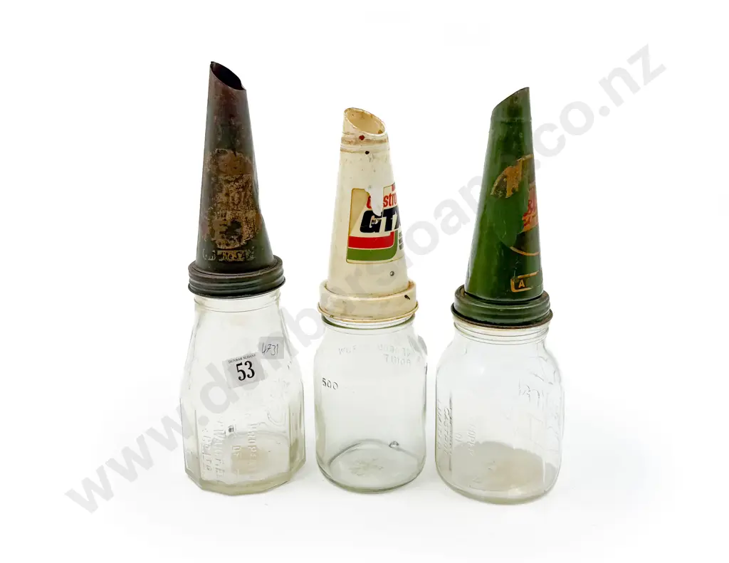 Three Smaller Glass Oil Bottles with Funnel Tops Image 1++