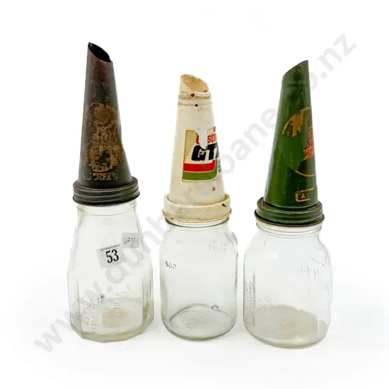 Three Smaller Glass Oil Bottles with Funnel Tops