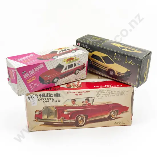 Three Boxed Tin Plate Vehicles