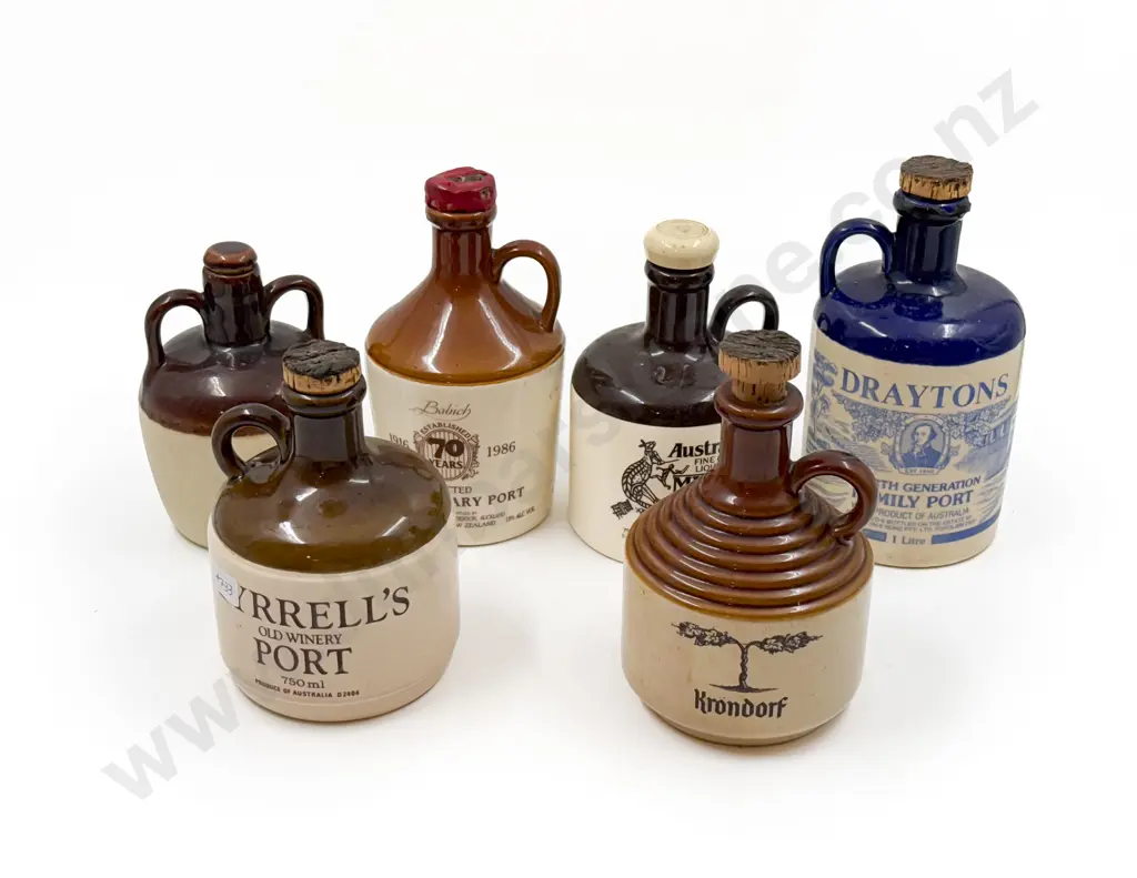 Four Assorted Stoneware Flagons Image 1++