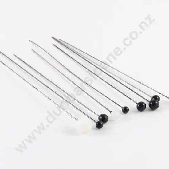 Nine Victorian Black and Milk Glass Ball Hat Pins