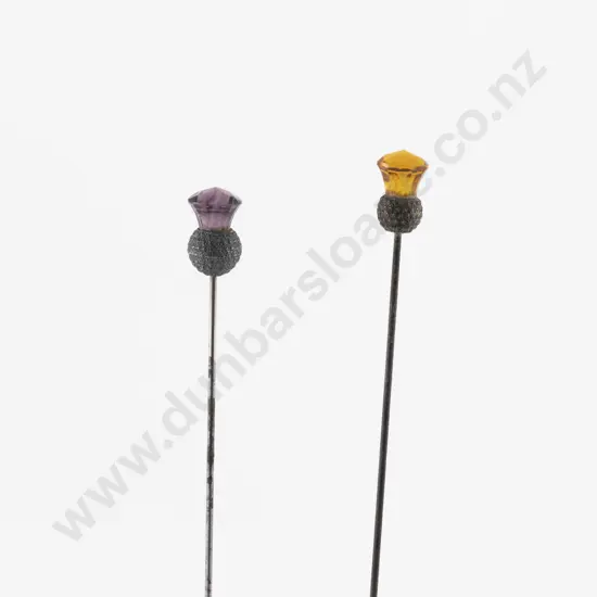 Two Late Victorian Silver Amber and Amethyst Glass Thistle Hat Pins