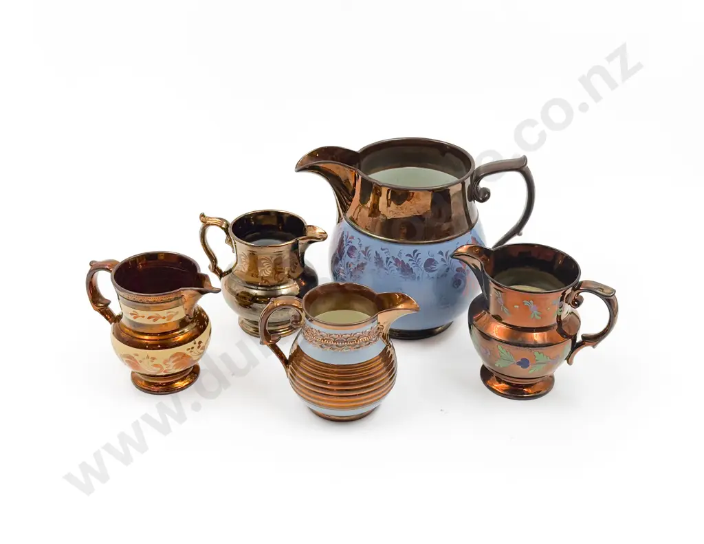 Five Copper Lustre Jugs Image 1++