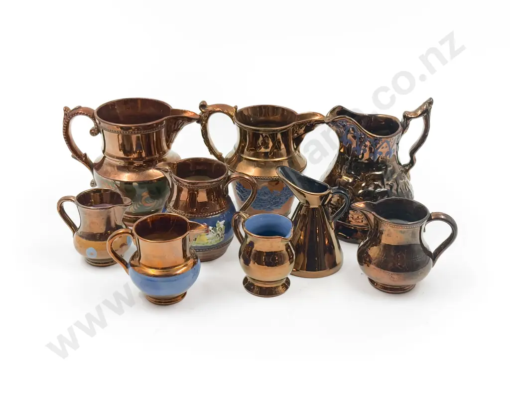 Nine Copper Lustre Jugs Image 1++