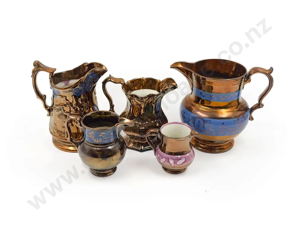 Five Copper Lustre Jugs Image 1++