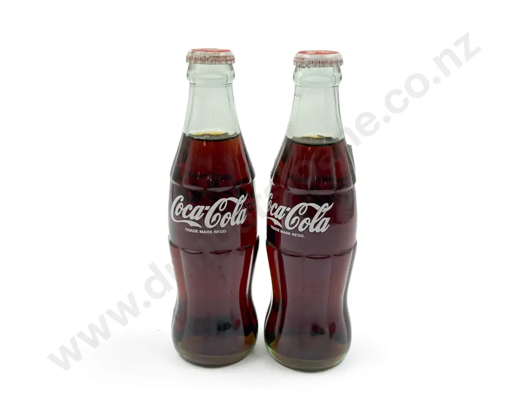 Pair of Vintage Unopened Glass Coke Bottles Image 1++