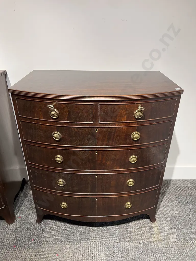 A Pair of Georgian Style Mahogany Bow Front Chests of Drawers Image 1++