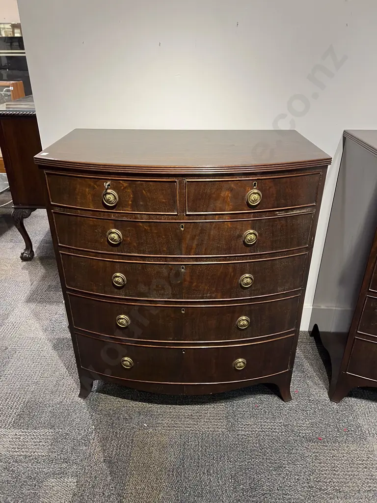 A Pair of Georgian Style Mahogany Bow Front Chests of Drawers Image 1++