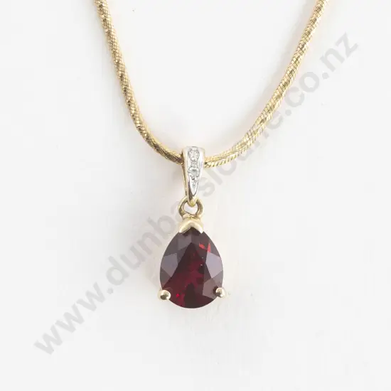 10ct Three Stone Garnet and Diamond Pendant